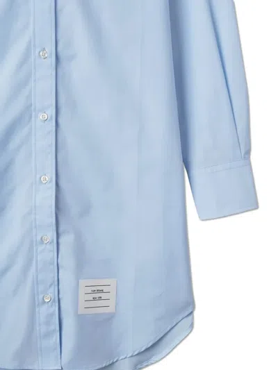 Thom Browne Classic Long Sleeve Button Down Point Collar Thigh Length Shirtdress With Grosgrain Placket In Solid In Blue