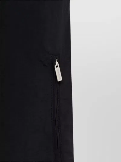 Jacquemus Relaxed Balloon Trousers Zipper Pockets In Black