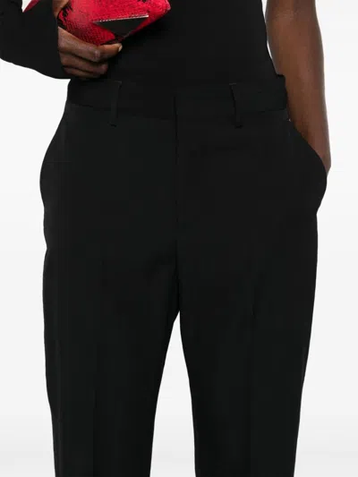 Dsquared2 Trousers With Pleated Front And Tapered Leg In Black