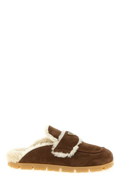Prada Round Toe Suede Mules With Shearling Lining In Brown