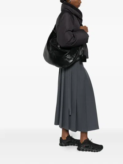 曲线形拉链单肩包