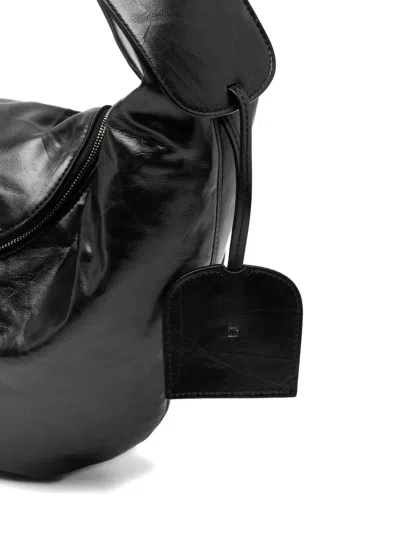 曲线形拉链单肩包