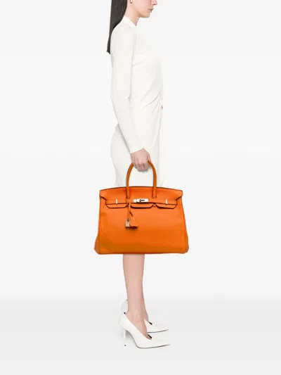 Pre-owned Hermes 2012 Togo Birkin Retourne 35 Handbag In Orange