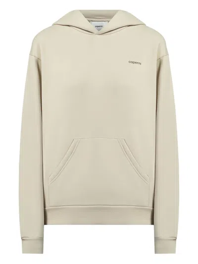 Coperni Logo-print Hoodie In Brown
