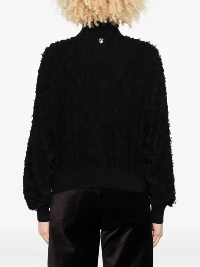 Twinset Textured Black Turtleneck Sweater With Ballooned Sleeves In Black