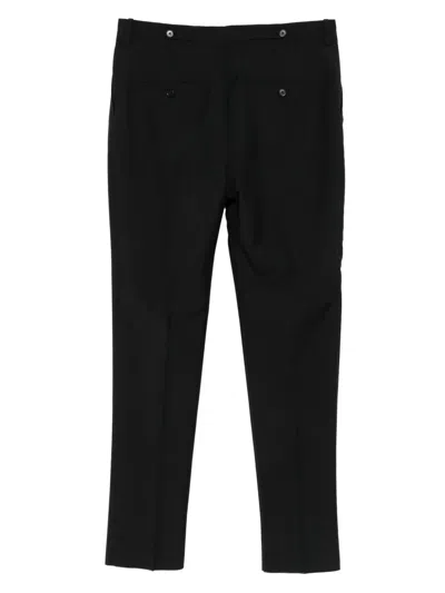 Alexander Mcqueen Pleated-front Wool Trousers In Black
