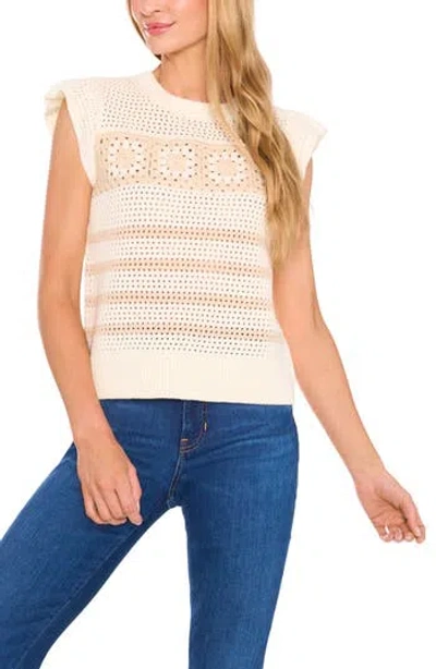 Cece Flower Cap Sleeve Open Knit Sweater In Brown