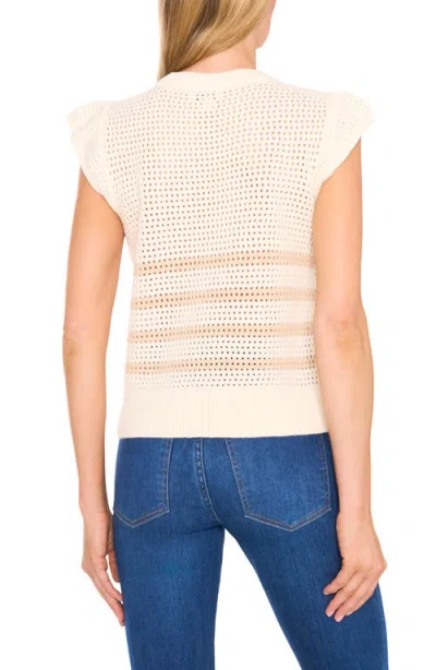 Cece Flower Cap Sleeve Open Knit Sweater In Brown