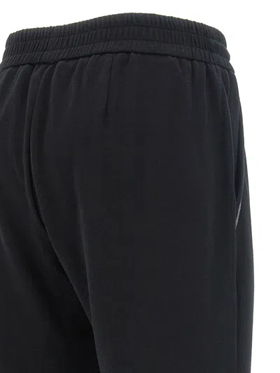 Brunello Cucinelli Casual Joggers With Drawstring And Stripe In Black