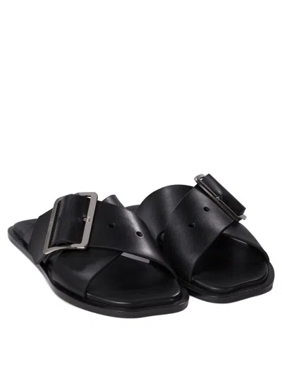 Loewe Petal Belt Cross-over Sandals In Black