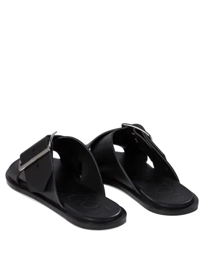 Loewe Petal Belt Cross-over Sandals In Black
