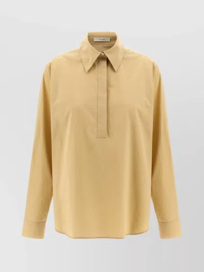 The Row Collared Long Sleeve Button Front Shirt In Yellow