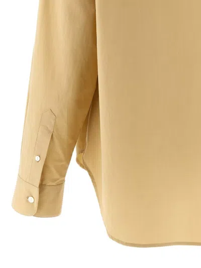 The Row Collared Long Sleeve Button Front Shirt In Yellow