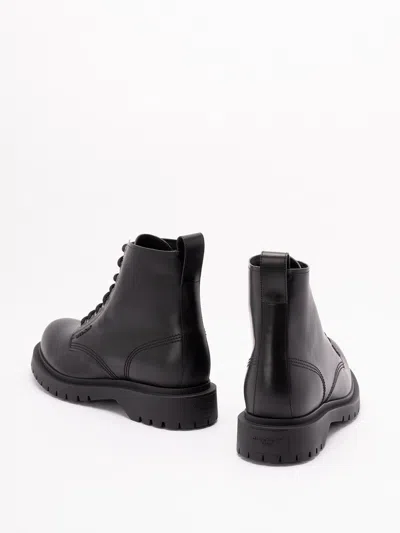 Givenchy Chunky Sole Leather Ankle Boots With Pull Tab In Black