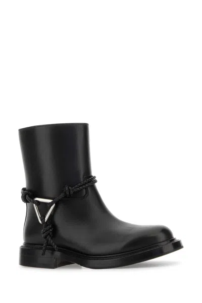 Bottega Veneta Women Black Ankle Boots With Metallic Detail On The Side And Applied Laces In Leather In Animal Print