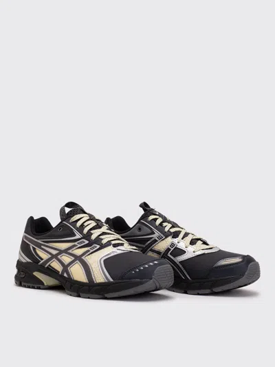 Asics Rounded Toe Sneakers With Grooved Sole And Sleek Finish In Gray