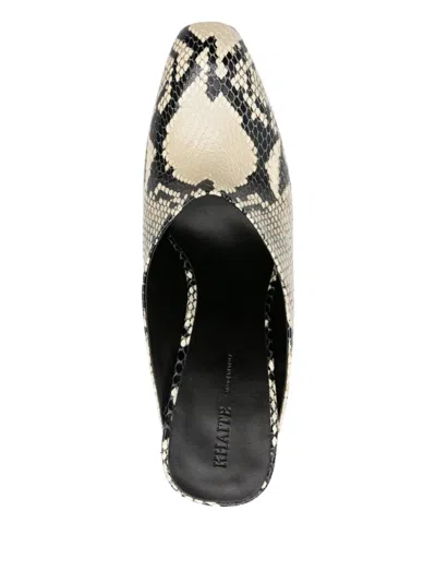 Khaite Colt 100 Python-effect Leather Mules In Animal Print
