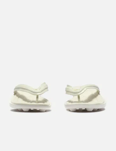 Puma X Fenty Cat Cleat Jelly Sandal In Neutral