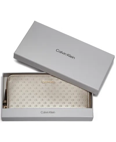 Calvin Klein Women's Moon Signature Embossed Boxed Wallet In Gold