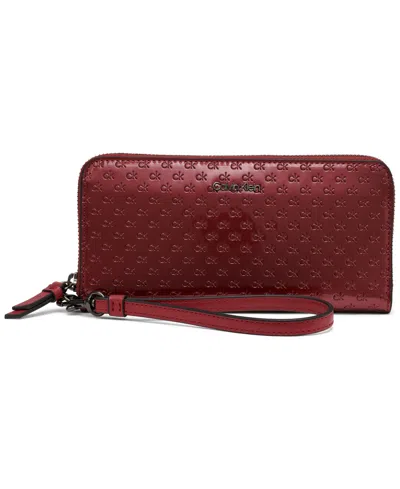 Calvin Klein Women's Moon Signature Embossed Boxed Wallet In Burgundy