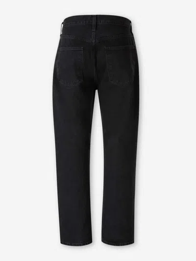 Agolde Vintage Frayed Hem Denim Trousers In Black