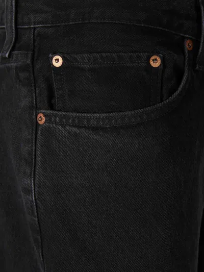 Agolde Vintage Frayed Hem Denim Trousers In Black