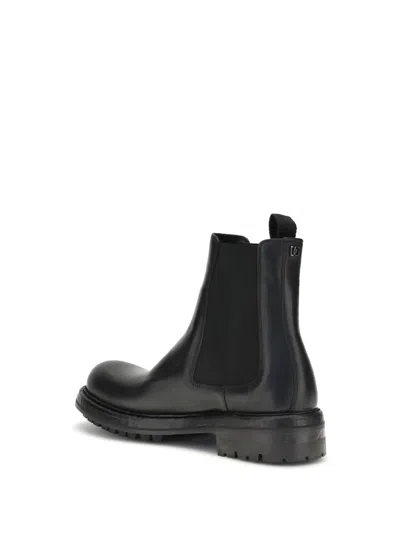 Dolce & Gabbana Leather Boots In Black