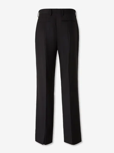 Carrer Cadore Trousers In Black