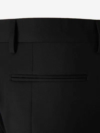 Carrer Cadore Trousers In Black