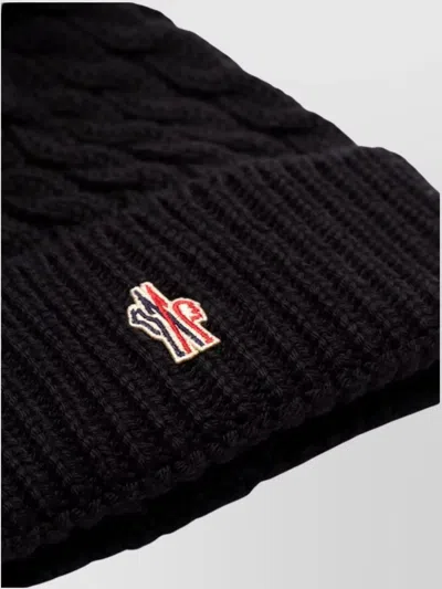 Moncler Wool Hat Featuring Cable Knit And Pom Detail In Black