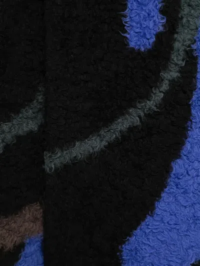 Khoki Patterned-jacquard Scarf In Blue