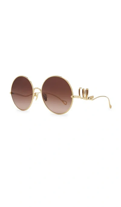 Chloé Round Frame Sunglasses Featuring Curved Temples In Brown