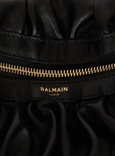 Balmain Ebene Medium Ruched Top-handle Bag In Leather In Black