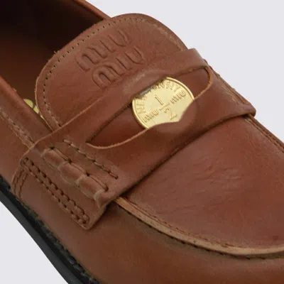 Miu Miu Round Toe Leather Loafers With Stitch Detail In Brown
