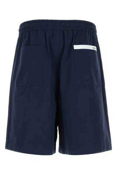 Gucci Men Navy Blue Poplin Bermuda Shorts In Animal Print