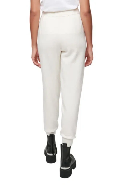 Maje Grommet Trimmed Jogger Pants In Sand