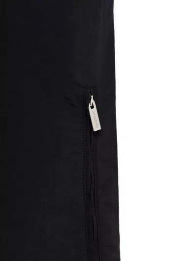 Jacquemus Relaxed Balloon Trousers Zipper Pockets In Black