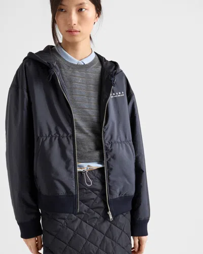 Prada Lightweight Re-nylon Hooded Blouson Jacket In Blue