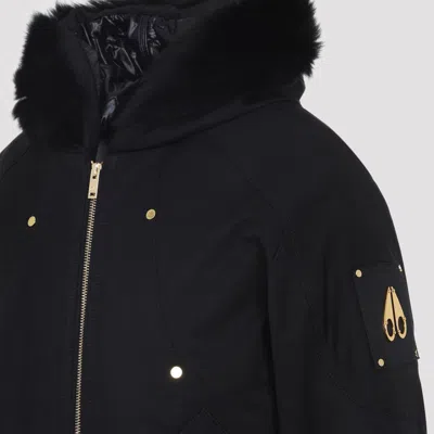 Moose Knuckles Fitted Hooded Jacket With Plush Fur Trim And Metallic Accents In Black