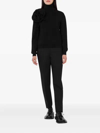 Moschino Black Turtleneck Sweater With Flower Detail In Black
