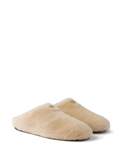 Prada Triangle-logo Shearling Mules In Neutral