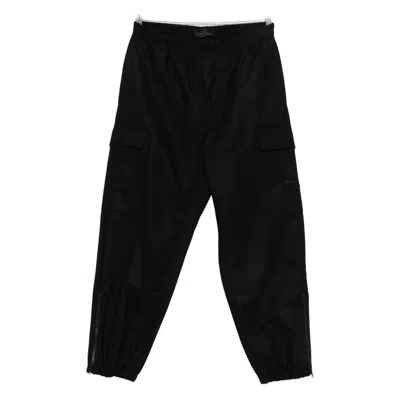 Stone Island Cargo Zipped-ankle Trousers In Black