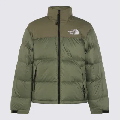 The North Face Insulated Jackets With Adjustable Cuffs And High Collar In Green