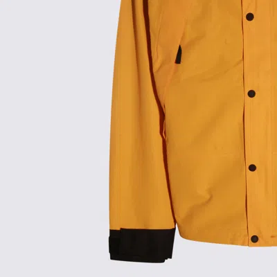 The North Face Yellow And Black Casual Jacket In Gold