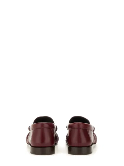 Saint Laurent Logo-plaque Pleated-effect Loafers In Brown