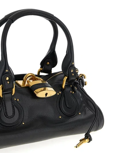 Chloé Structured Shoulder Bag With Padlock And Studs In Black