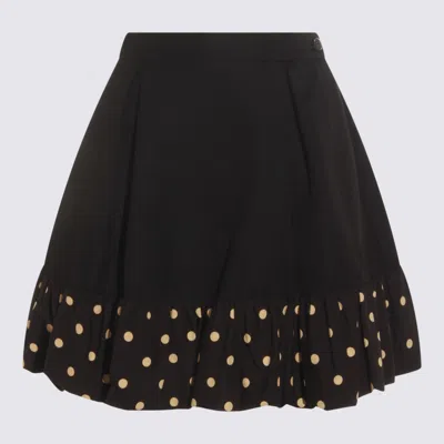 Moschino Polka Dots Wool Blend Diagonal Miniskirt In Black