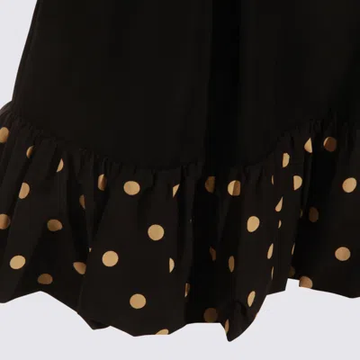 Moschino Polka Dots Wool Blend Diagonal Miniskirt In Black