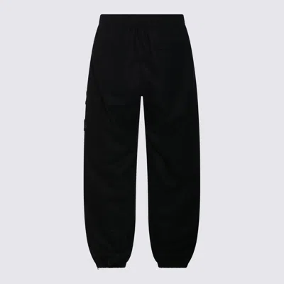 Stone Island Loose-fit Cargo Trousers With Elasticated Zipped Cuffs In Black