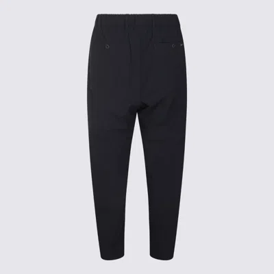 Herno Trousers With Back Pockets And Button Detail In Black